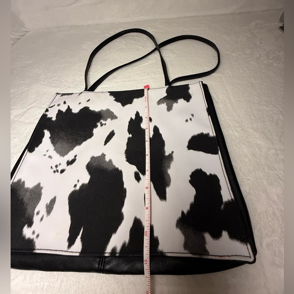 Cowprint Black and White Tote Bag with a Red Interior - Picture 6 of 7